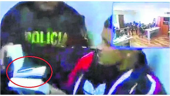 ​Investigan a policía por facilitar celular a un reo durante lectura de sentencia (VIDEO)