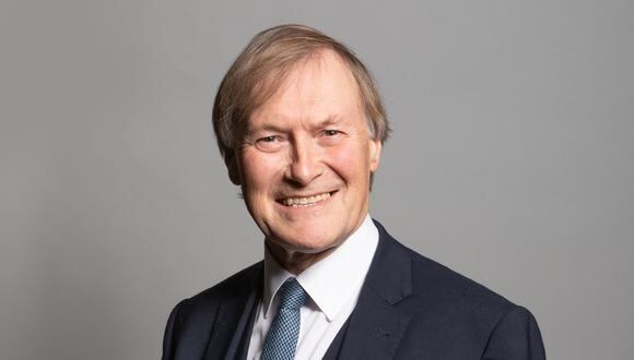 An undated handout photograph released by the UK Parliament shows Conservative MP for Southend West, David Amess, posing for an official portrait photograph at the Houses of Parliament in London. - British MP David Amess was on Friday stabbed "multiple times" during an event in his local constituency in Leigh-on-Sea in Essex, southeast England, Sky News and BBC reported. Essex Police did not name Amess but confirmed that officers "were called to reports of a stabbing in Eastwood Rd North shortly after 12.05pm. A man was arrested shortly after & we're not looking for anyone else." (Photo by Richard TOWNSHEND / UK PARLIAMENT / AFP) / RESTRICTED TO EDITORIAL USE - NO USE FOR ENTERTAINMENT, SATIRICAL, ADVERTISING PURPOSES - MANDATORY CREDIT " AFP PHOTO / RICHARD TOWNSHEND /UK Parliament"