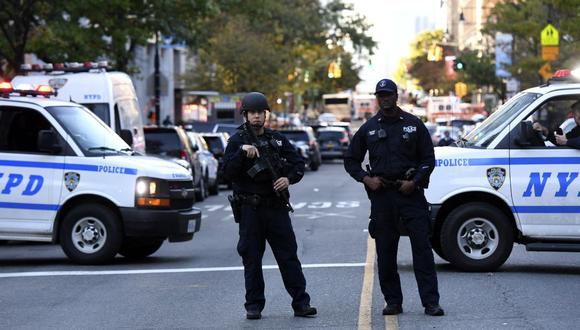 Agentes de policía aseguran un área luego de un tiroteo en Nueva York (Estados Unidos), el 31 de octubre de 2017.  (Don EMMERT / AFP).