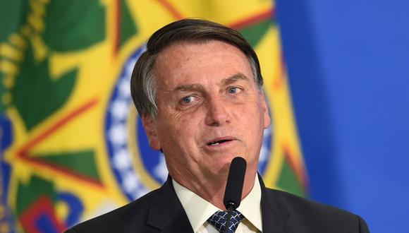 El presidente brasileño, Jair Bolsonaro, pronuncia un discurso durante la ceremonia de nombramiento de los nuevos jefes de los bancos públicos, en el Palacio Planalto de Brasilia. (AFP/EVARISTO SA).