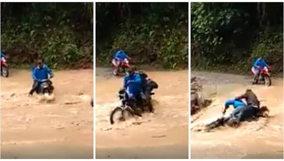 Motociclistas arriesgan sus vidas al cruzar por vía inundada por río (VIDEO)