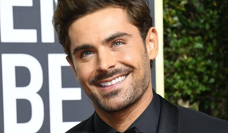 Zac Efron fue ingresado de emergencia al hospital después de sufrir una "urgencia médica que lo estaría dejando entre la vida o muerte".