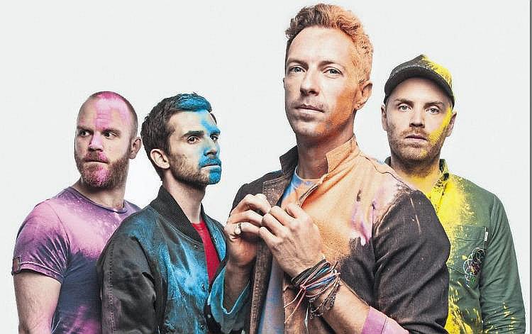 Coldplay dona guitarra autografiada para niños especiales [FOTO]