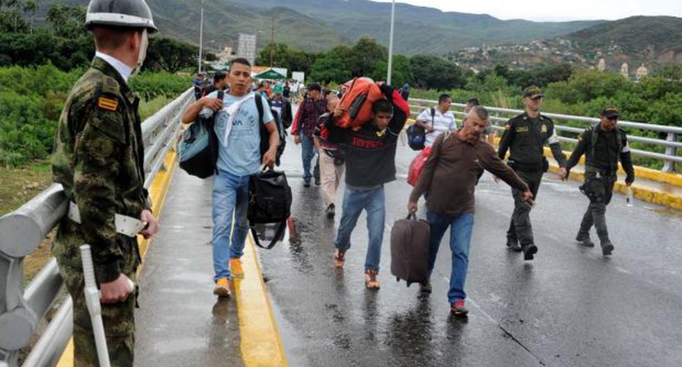 Colombia dice que el regreso de 24.000 venezolanos a su país tardará seis meses. (Foto: AFP).