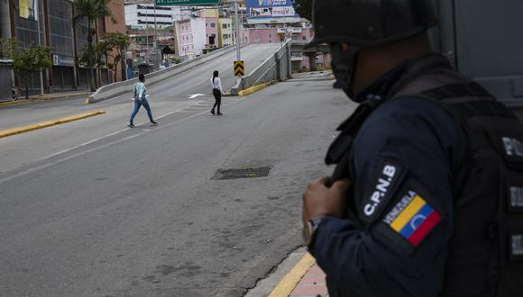 La mujer, de 27 años de edad, fue detenida por la policía municipal de la localidad Ezequiel Zamora. (Foto referencial: Yuri CORTEZ / AFP)