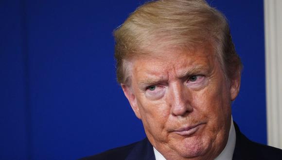 El expresidente de los Estados Unidos, Donald Trump, reacciona durante la sesión informativa diaria sobre el nuevo coronavirus en la Casa Blanca. (AFP / MANDEL NGAN).