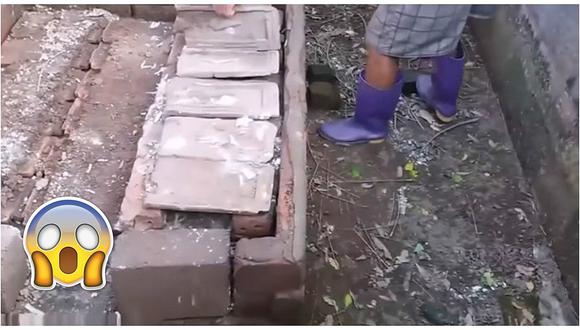 YouTube: sacaba ladrillos del suelo de su casa y se da con aterrador hallazgo (VIDEO)