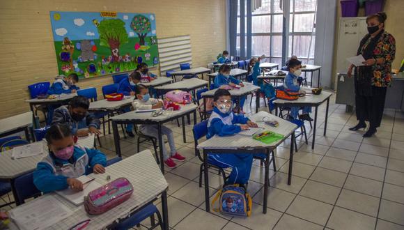 El personal de la escuela actuó de inmediato y avisó a las familias de los menores involucrados para que vayan a hacerse pruebas de descarte. (Foto: Claudio Cruz / AFP)