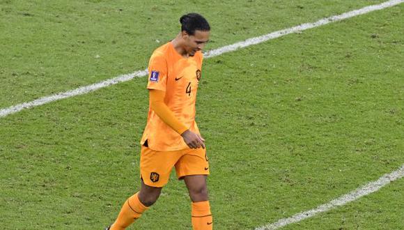 Netherlands' defender #04 Virgil van Dijk reacts after he missed a shot in the penalty shoot-out during the Qatar 2022 World Cup quarter-final football match between The Netherlands and Argentina at Lusail Stadium, north of Doha on December 9, 2022. (Photo by PATRICIA DE MELO MOREIRA / AFP)