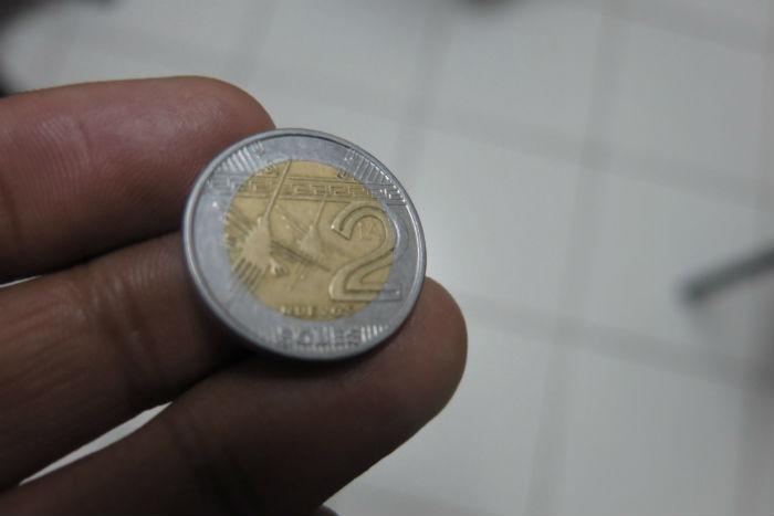 Niño traga moneda de dos soles y vive