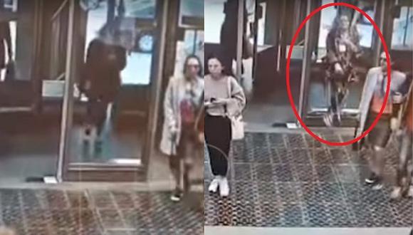 Joven destruye una puerta de vidrio por estar concentrada en su celular (VIDEO)