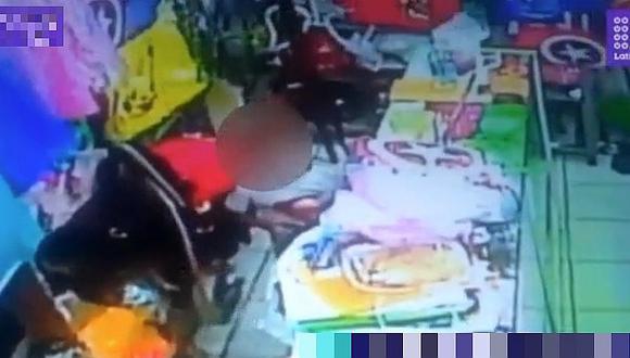 Captan a mujer usando a un niño para robar en tienda del Centro de Lima (VIDEO)