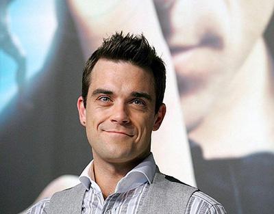 Robbie Williams anuncia que será padre por primera vez