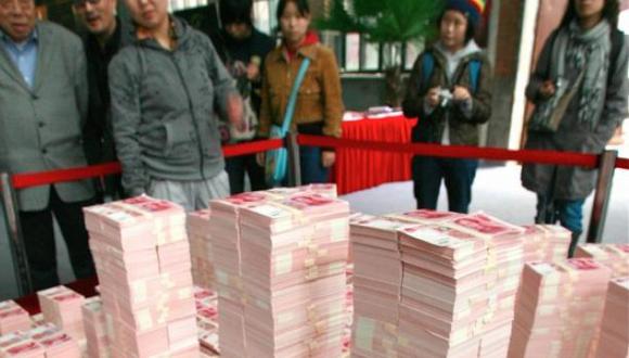 China: Gobierno anuncia grandes recortes salariales en empresas estatales