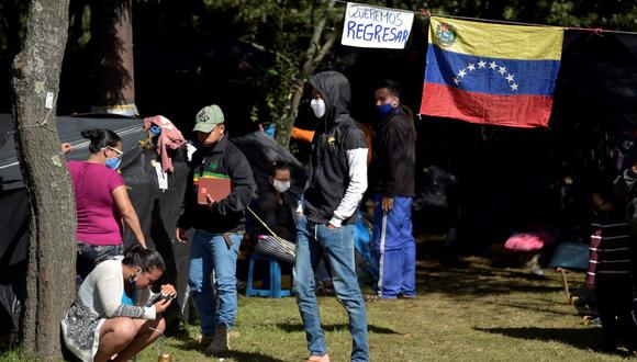 La oposición venezolana denunció el domingo la deportación de los 16 menores, entre los que está un bebé de cuatro meses. (Raul ARBOLEDA / AFP)