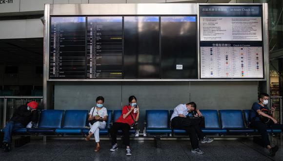 Un total de 13 contagios por COVID-19 se diagnosticaron a viajeros procedentes del extranjero, mismos que llegaron a distintos lugares de China. (Anthony WALLACE / AFP).