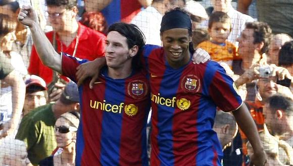 Sandro Rosell, ex presidente del Barcelona, afirmó que Ronaldinho superó a Leo Messi un par de temporadas. (Foto: AFP)