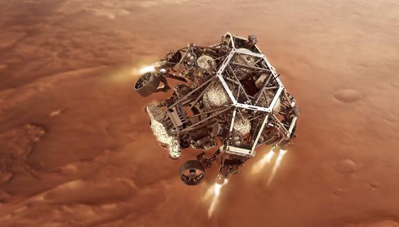 Esta ilustración muestra al vehículo Perseverance de la NASA mientras enciende sus motores de etapa de descenso, mientras se acerca a la superficie marciana. (Foto: Handout / NASA / AFP)