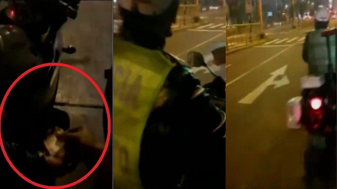 Policía recibió 20 soles de coima de motociclista que se habría pasado la luz roja (VIDEO)