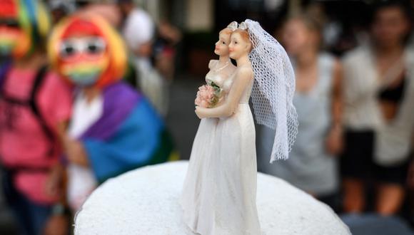 El proyecto de ley que protege el matrimonio entre personas del mismo sexo deberá ahora ser promulgado por el presidente Joe Biden. (Foto: FABRICE COFFRINI / AFP)