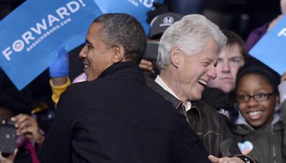 Obama y Bill Clinton juegan golf 