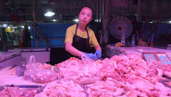 En la ciudad china de Shenzhen, perteneciente a la provincia meridional de Cantón, han encontrado trazas de coronavirus en muestras de un lote de alitas de pollo congeladas importadas de Brasil. (EFE / Wu Hong / Archivo)