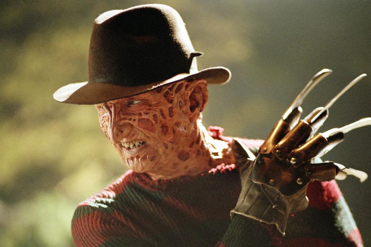 Una pesadilla en Elm Street Freddys cara con sombrero Huggie puede refrigerador Koozie sin usar 