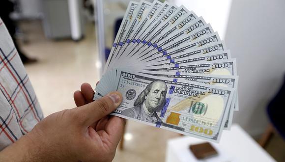 Moneda presenta una subida de 0.08% en comparación a los S/ 3.641 del cierre del lunes. (Foto: AFP)