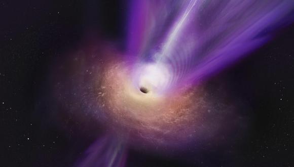 Representación artística en la que el chorro masivo del agujero negro se ve elevándose desde el centro del agujero negro. Las observaciones en las que se basa la ilustración representan la primera vez que el chorro y la sombra del agujero negro se han fotografiado juntos. La galaxia Messier 87 se hizo famosa porque de ella era la primera fotografía de un agujero negro. (Foto: EFE/S. Dagnello (NRAO/AUI/NSF))