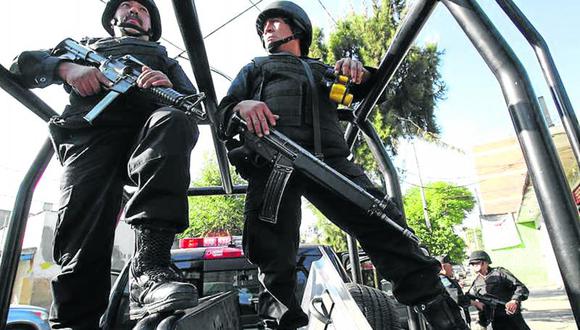 Detienen a 13 policías mexicanos por asesinatos y secuestros