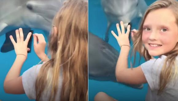 Niña sorprende con técnica para comunicarse con delfines (VIDEO)