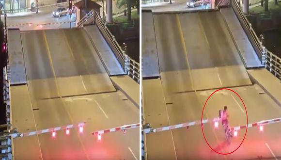 Ciclista trata de pasar por puente levadizo y casi pierde la vida (VÍDEO)