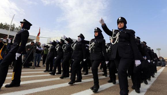 Iraqi policewomen march during a ceremony to mark the 94th anniversary of the creation of the Iraqi police at a police academy in the capital Baghdad on January 9, 2016. AFP PHOTO / SABAH ARAR (Photo by SABAH ARAR / AFP)