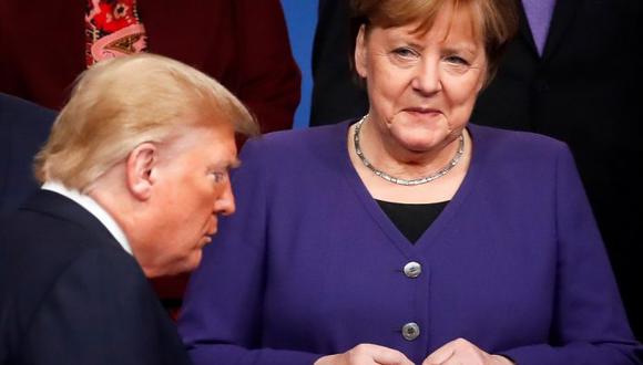 A pesar de tener ciertas discrepancias con el mandatario, Angela Merkel apeló a la "libertad de expresión" al verlo vetado en las redes sociales. (Foto: AFP)