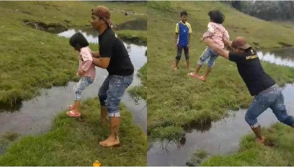 Hombre evita que su hija se moje al cruzar arroyo, pero él no tuvo la misma suerte (VIDEO)