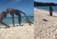 Maestra de yoga es mordida por iguana en plena clase a orillas del mar 