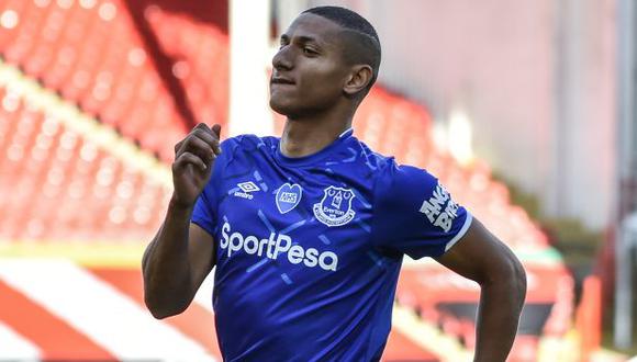 Everton's Brazilian striker Richarlison celebrates after scoring a goal during the English Premier League football match between Sheffield United and Everton at Bramall Lane stadium in Sheffield, northern England, on July 20, 2020. (Photo by Rui Vieira / POOL / AFP) / RESTRICTED TO EDITORIAL USE. No use with unauthorized audio, video, data, fixture lists, club/league logos or 'live' services. Online in-match use limited to 120 images. An additional 40 images may be used in extra time. No video emulation. Social media in-match use limited to 120 images. An additional 40 images may be used in extra time. No use in betting publications, games or single club/league/player publications. / ALTERNATIVE CROP