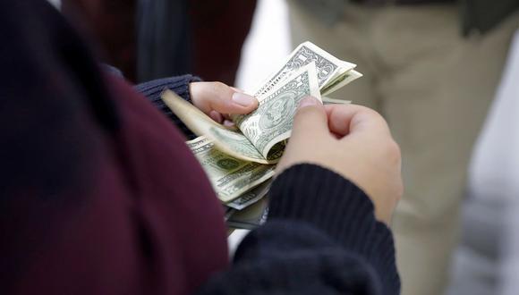 Moneda presenta una subida de 0.08% en comparación con los S/ 3.608 del cierre del miércoles. (Foto: AFP)