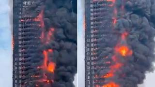 China: incendio arrasa un rascacielos de 218 metros de altura (VIDEO)