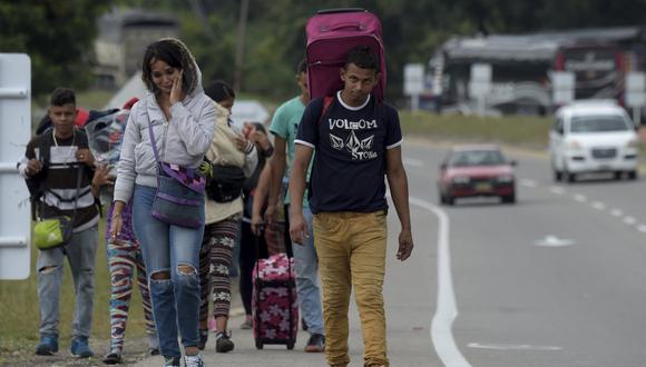Los venezolanos contarán con un estatuto de protección temporal por diez años, tiempo en el cual podrán tramitar una visa de residentes si deciden quedarse en el país. (Foto: Raul ARBOLEDA / AFP)
