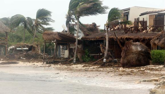 Las autoridades mexicanas llamaron a la calma luego de que el huracán Grace tocó tierra en el Caribe mexicano, por el municipio de Tulum, acarreando fuertes lluvias. (EFE/ Alonso Cupul)