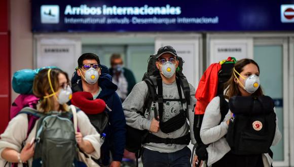 China detecta 10 nuevos contagios de COVID-19 procedentes del extranjero. (Foto: AFP / Ronaldo SCHEMIDT)