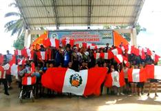 Escolares de Huánuco realizan banderazo apoyando a la selección
