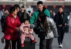 China: Ciudadanos se resisten a caer en el caos por el misterioso virus que se propaga (FOTOS)