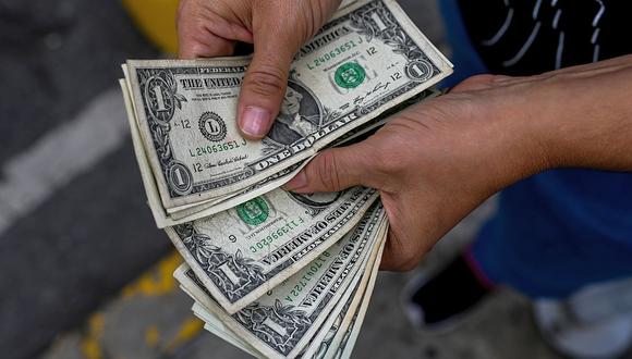 El dólar ha presentado una subida de 0.32% en comparación a los S/ 3.607 del cierre del viernes (Foto: AFP)