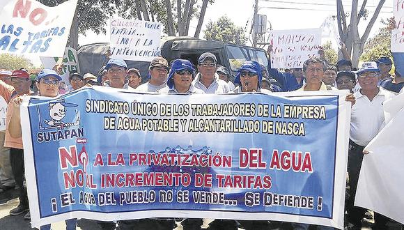 Trabajadores en marcha de protesta contra la privatización