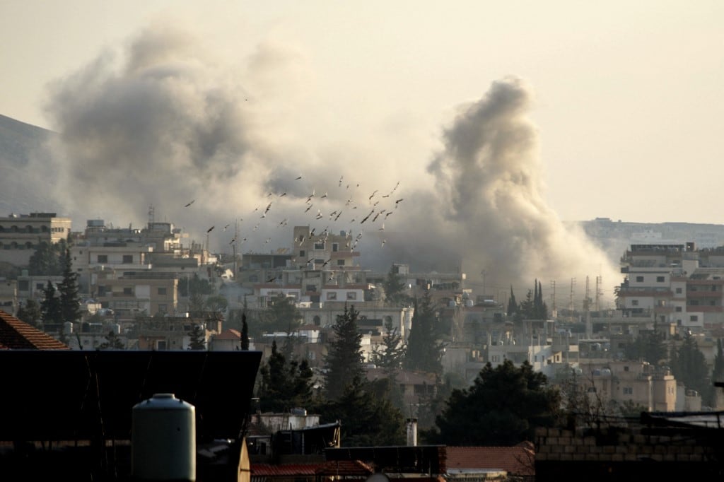 Smoke rises from the site of an Israeli airstrike that targeted the offices of Al-Qard al-Hassan, a Hezbollah-linked financial institution, in the city of Baalbeck in Lebanon's Bekaa valley on March 2, 2026. Israel bombarded Lebanon on March 2, expanding the conflict across the region after the massive Israel-US attack on Iran that the US president launched to topple Tehran's ruling clerics, and killing their supreme leader o February 28. (Photo by Nidal SOLH / AFP)