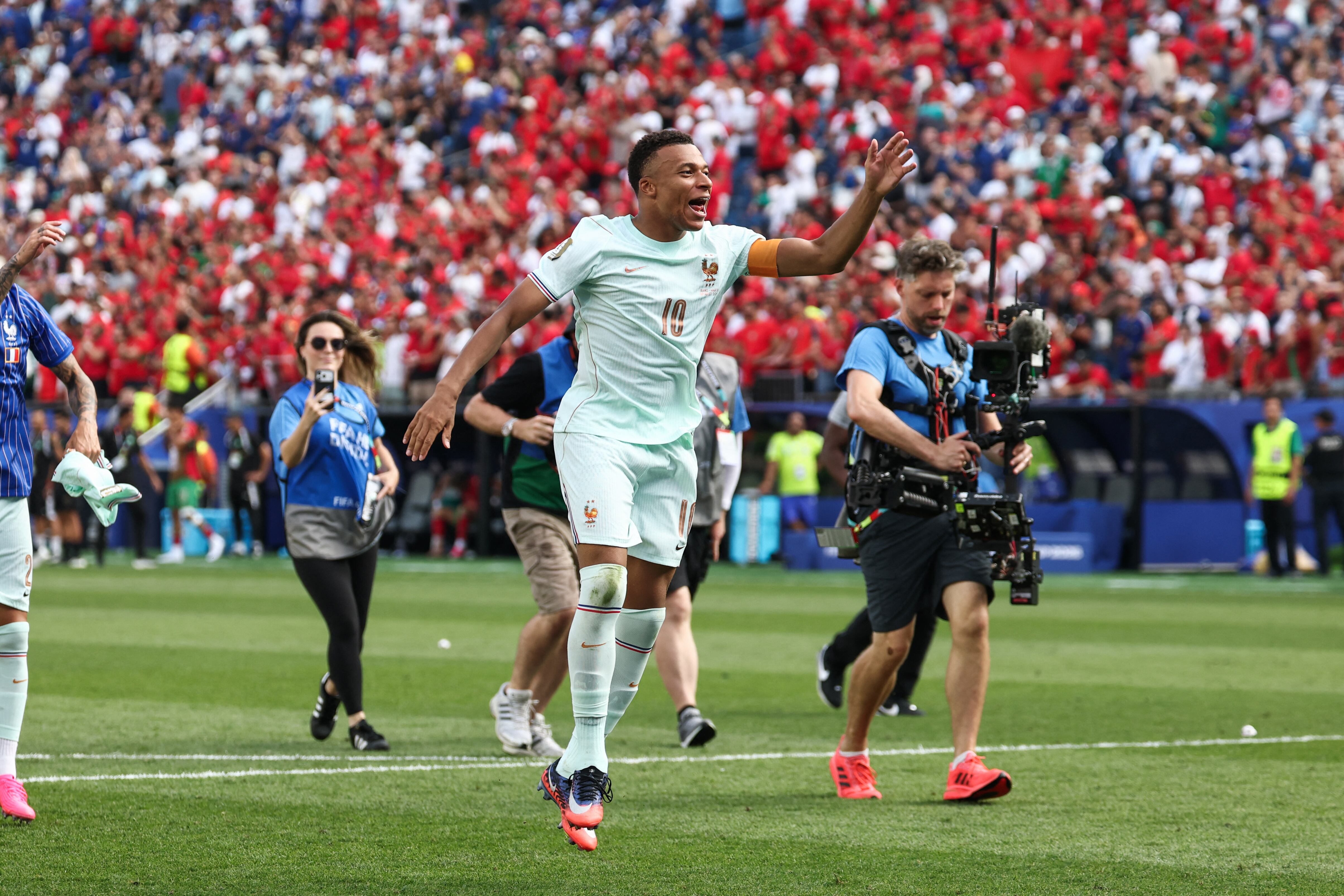 France's forward #10 Kylian Mbappe celebrates after winning the 2026 World Cup football tournament quarter-final match between France and Morocco at Boston Stadium in Foxborough on July 9, 2026. (Photo by FRANCK FIFE / AFP)