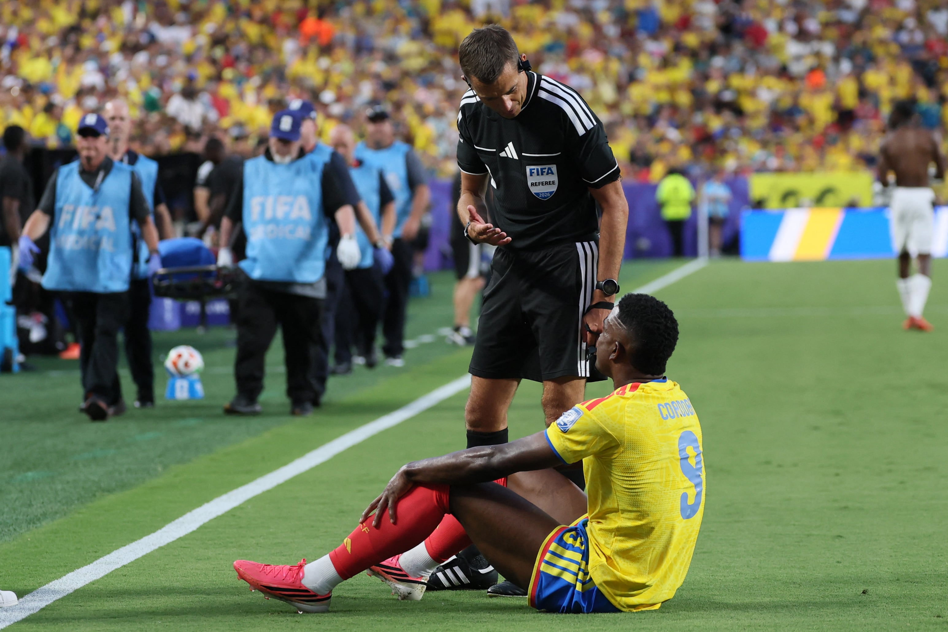 Colombia's forward #09 Jhon Cordoba reacts after an injury during the 2026 World Cup round of 32 football match between Colombia and Ghana at the Kansas City Stadium in Kansas City on July 3, 2026. (Photo by Odd ANDERSEN / AFP)