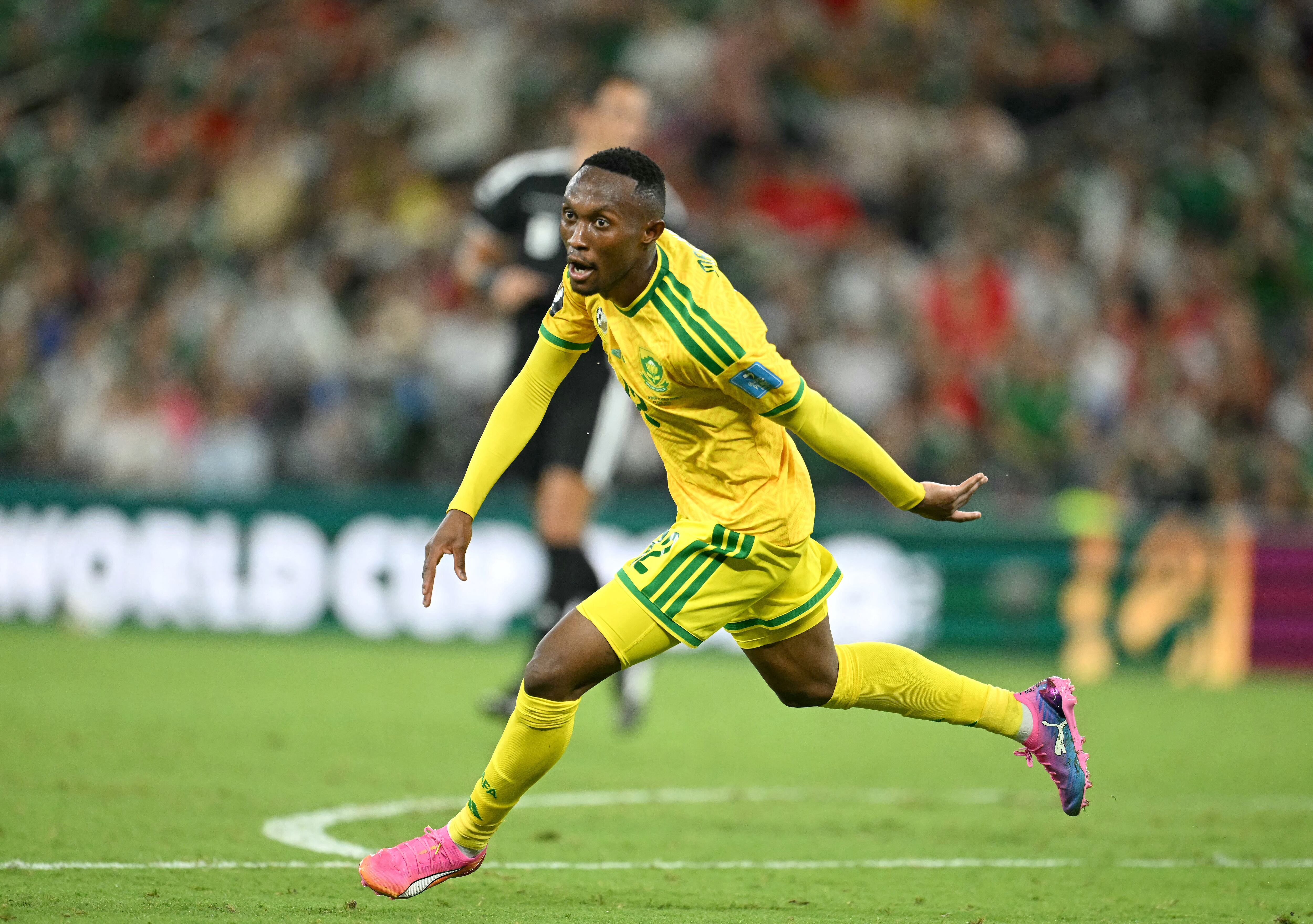 South Africa's forward #12 Thapelo Maseko celebrates scoring his team's first goal during the 2026 World Cup Group A football match between South Africa and South Korea at the Monterrey Stadium in Guadalupe, Mexico, on June 24, 2026. (Photo by Yuri CORTEZ / AFP)